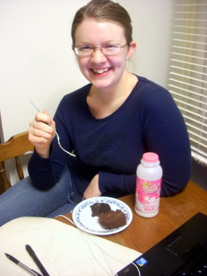 Corinne eats the brownies with a side of gleefulness